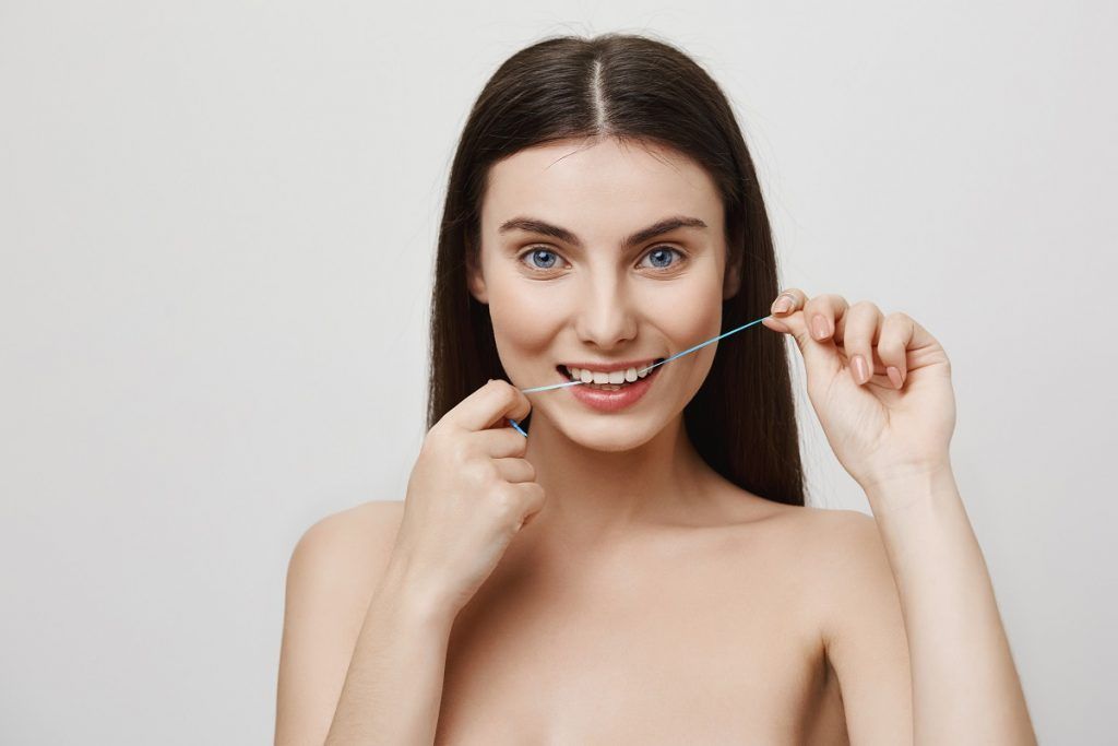 hilo-dental-dientes-y-encías-dc-dental-alcorcon-dentista